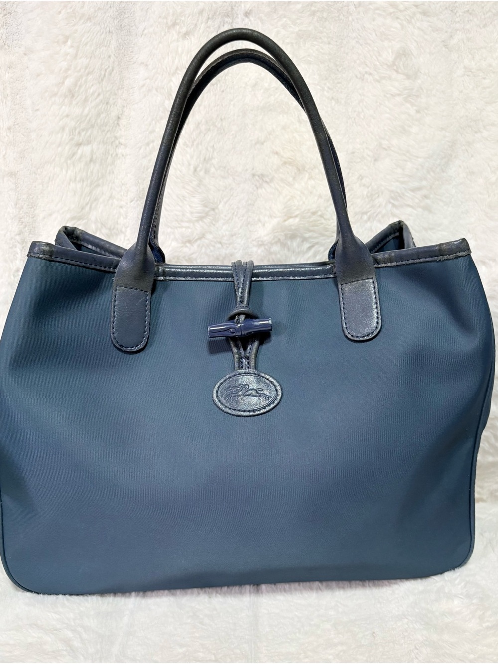 Longchamp Roseau tote bag featuring a blue synthetic nylon body